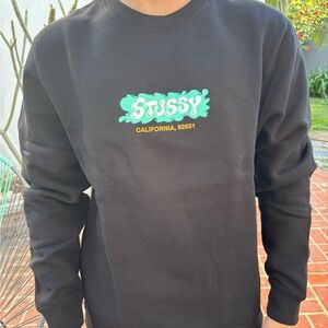 Stussy Black Crewneck with Teal Logo and Yellow Text